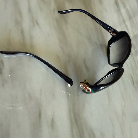 Gucci Accessories - Gucci Black Women’s Sunglasses with Gold Accent